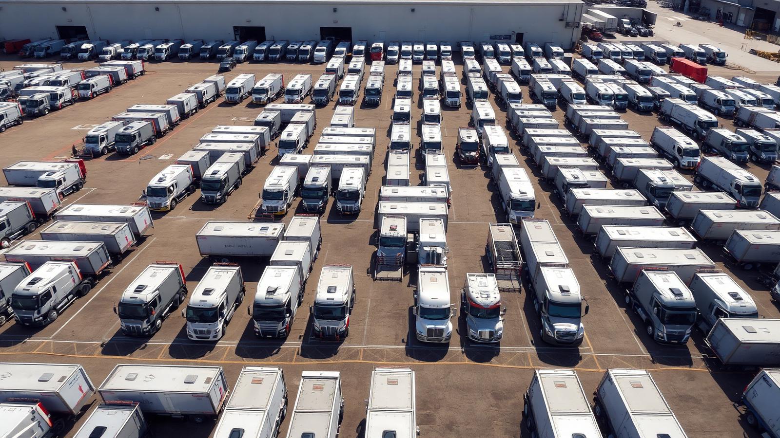 Aerial view of a large fleet of semi-trucks